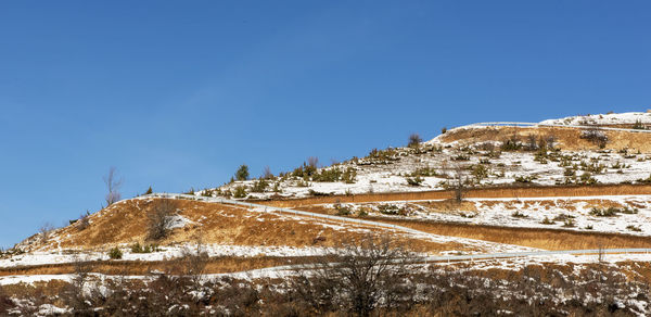 Winding road with blue sky