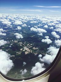 Aerial view of clouds over sea from airplane