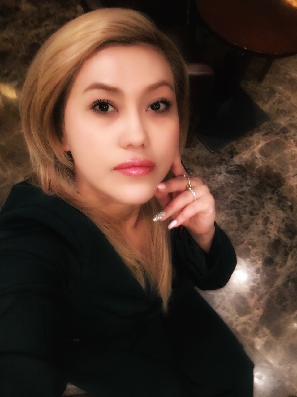 one person, real people, beautiful woman, young adult, bad habit, young women, looking at camera, indoors, close-up, blond hair, day, one young woman only