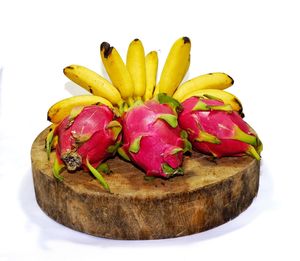 Close-up of fruit against white background