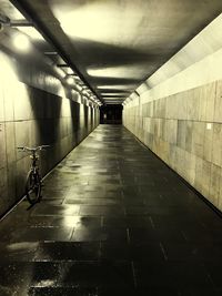 Man riding bicycle in subway