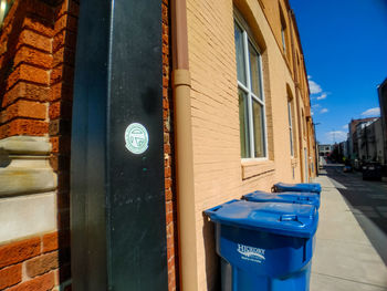 Information sign on wall of building in city