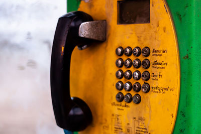 Close-up of old telephone booth