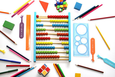 School supplies over white background