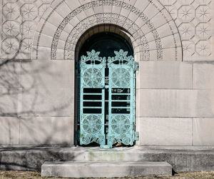 Historic city graveyard green patina doors