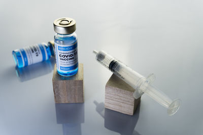 High angle view of bottles on table