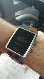 High angle view of hand holding text at home