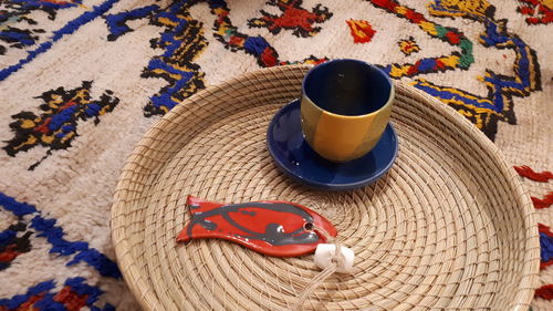 High angle view of coffee cup on table