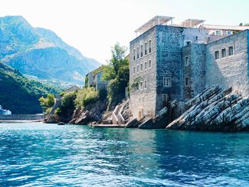 View of buildings by sea