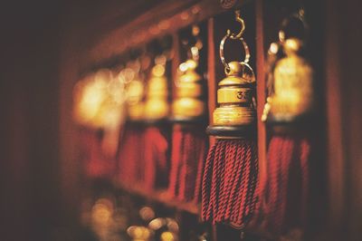 Close-up of tassel hanging in shelves