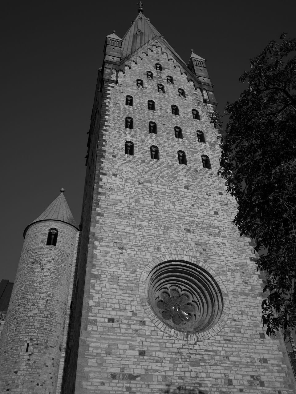 architecture, built structure, building exterior, black and white, low angle view, tower, monochrome, building, history, the past, monochrome photography, black, place of worship, white, sky, no people, religion, castle, nature, belief, travel destinations, spirituality, clear sky, outdoors, darkness, clock, old, travel