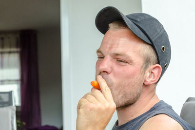 Close-up of man eating food