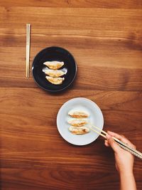 Directly above shot of person holding breakfast