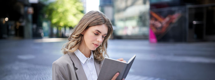 Young woman using mobile phone