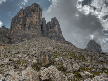 Low angle view of rock formations against sky