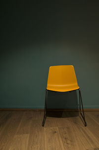 Empty chair on table at home