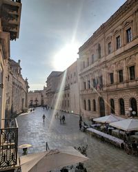 Panoramic view of people in city