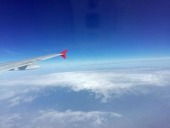 Airplane flying over landscape