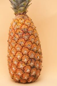 Close-up of fruit against white background