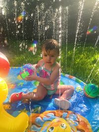 Girl playing in water