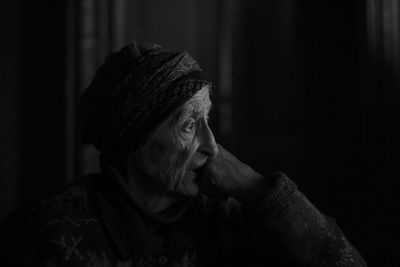 Close-up of senior woman looking away