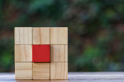 Close-up of wooden structure on table