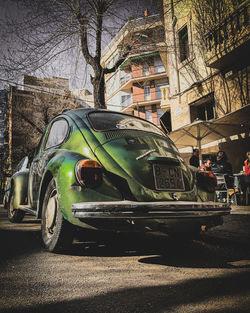 Cars parked on road in city