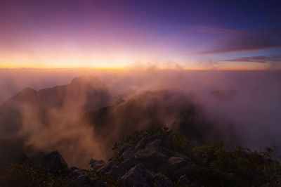 Scenic view of mountains against sky during sunset