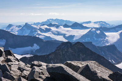 Scenic view of snowcapped mountains against sky