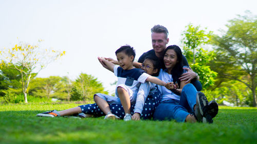 Happy family enjoying at park