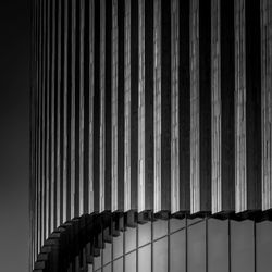 Low angle view of railing on wall