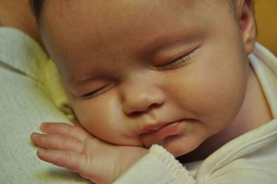 Close-up of baby girl sleeping