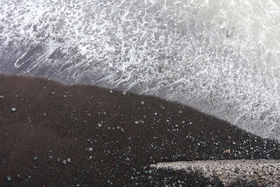 Sea waves splashing on rocks