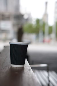 Close-up of coffee cup on table