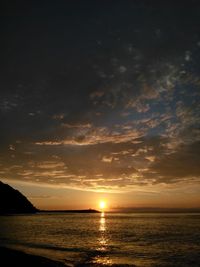 Scenic view of sea at sunset