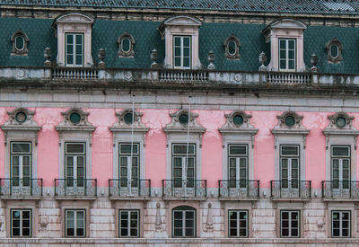 Low angle view of old building in city