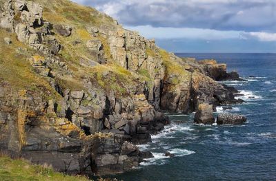 Idyllic shot of rock formation in sea