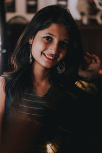 Portrait of a smiling young woman