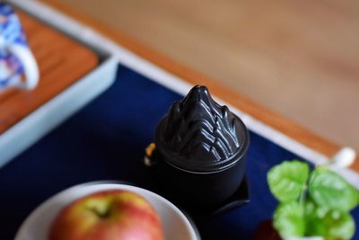 High angle view of black tea on table