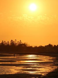 Scenic view of sunset over sea