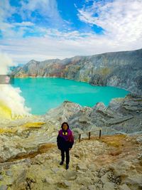 A lady traveller in the top of ijen mountain, banyuwangi, indonesia