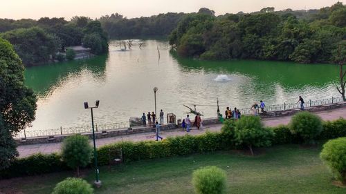 Scenic view of lake against trees