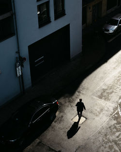 High angle view of man on street in city