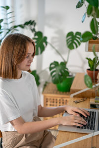 Young woman using mobile phone