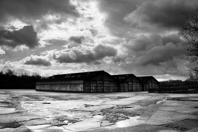 Built structure against cloudy sky