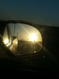 View of illuminated city at sunset