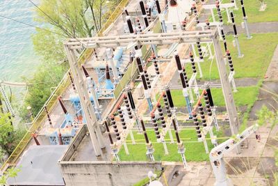 High angle view of staircase by trees on field