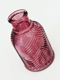 High angle view of glass jar on white background