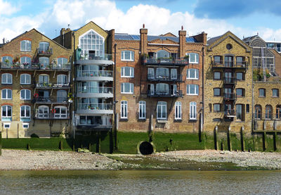 Buildings on the thames river shore