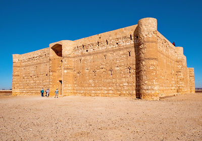 Old ruins against clear blue sky